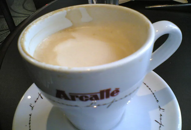 A latte in a cup