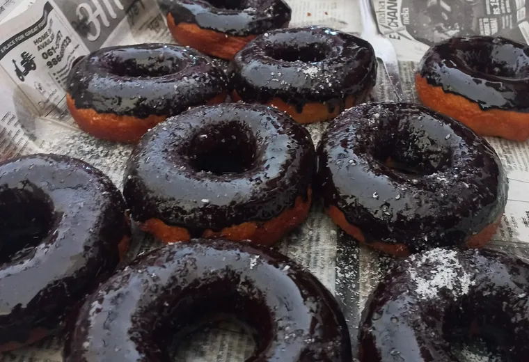 Chocolate donuts Chocolate-glazed donuts stacked