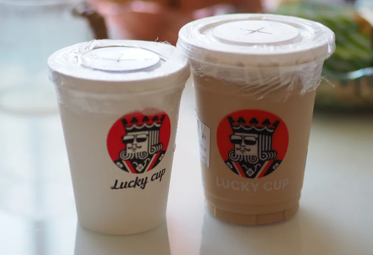 Two iced coffees in cups