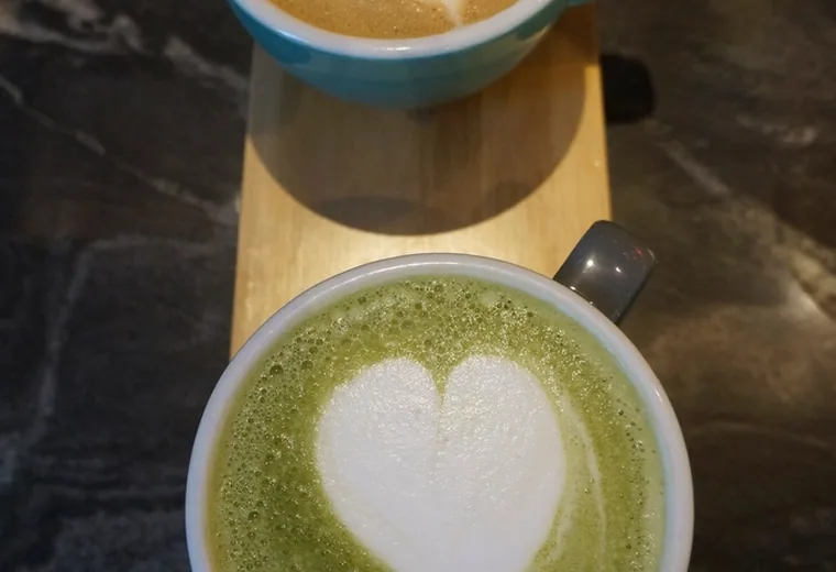 A matcha latte with latte art