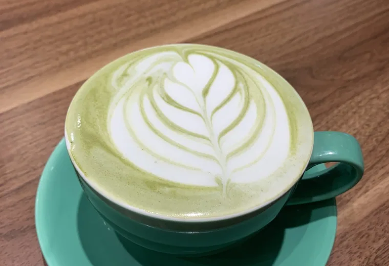 A matcha latte with leaf art