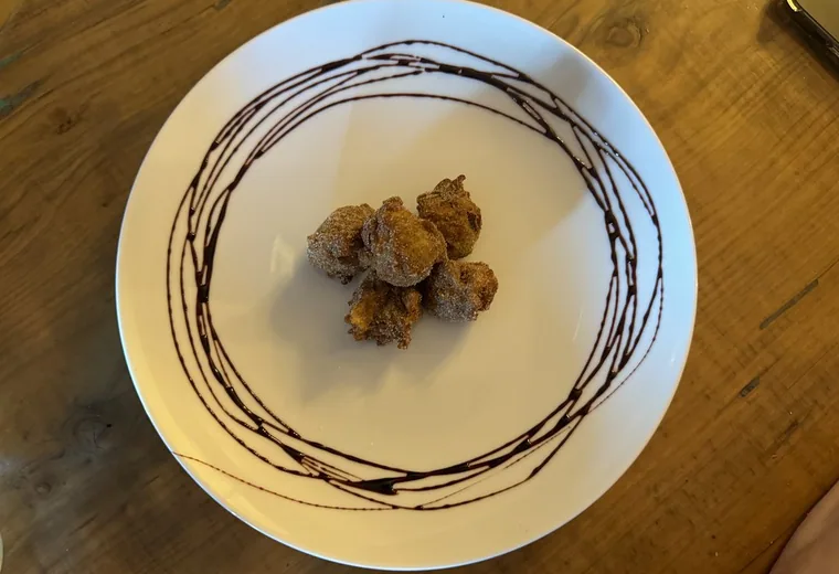 Bite-size donut holes on a plate