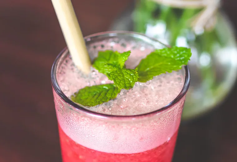 A pink fruit refresher with mint