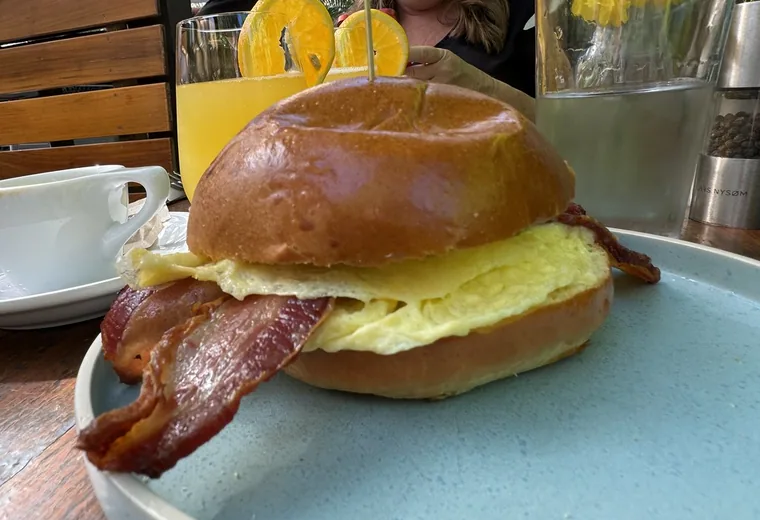Breakfast sandwich A breakfast sandwich on a bun with bacon and egg